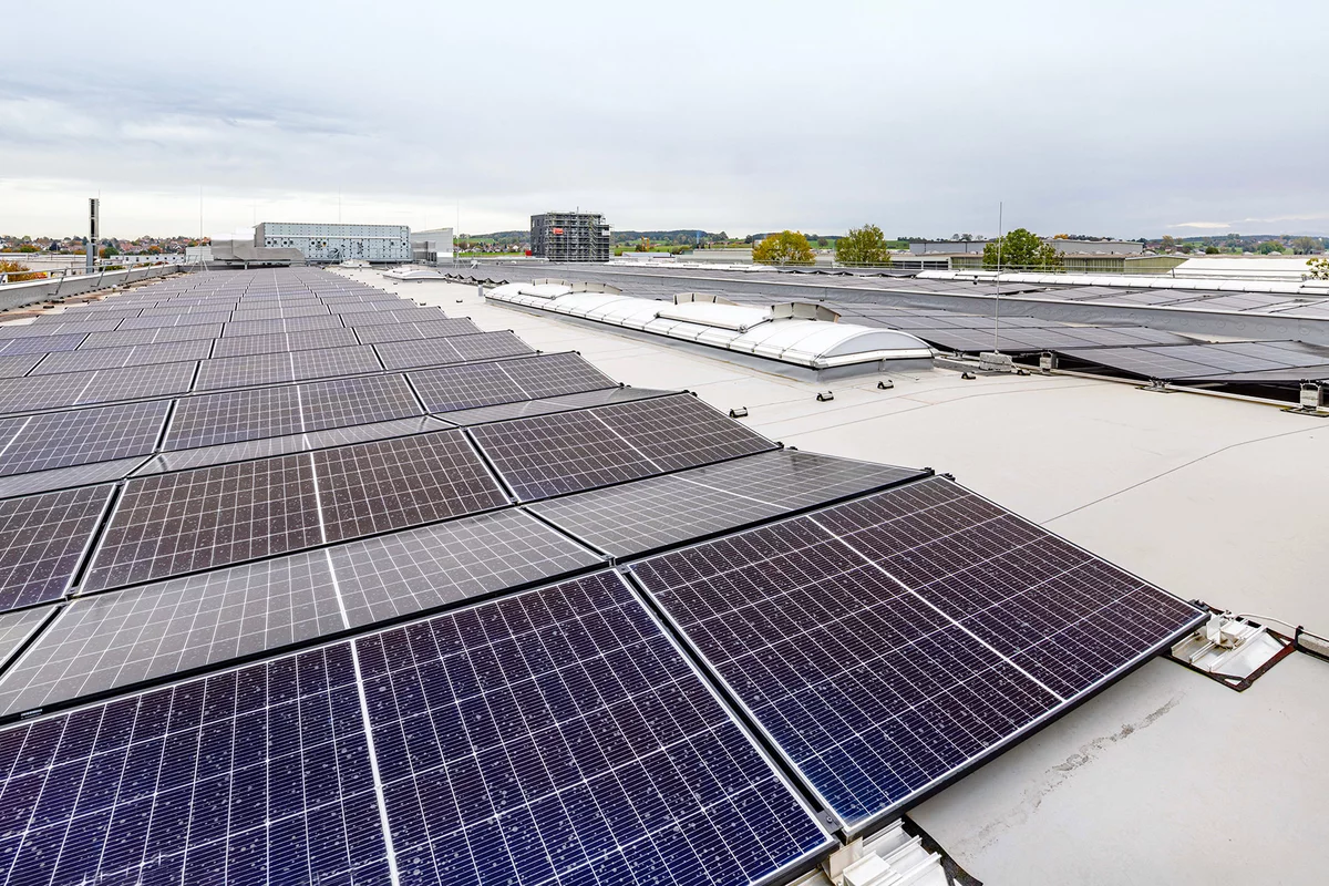 Solar panels on the roof of an industrial building